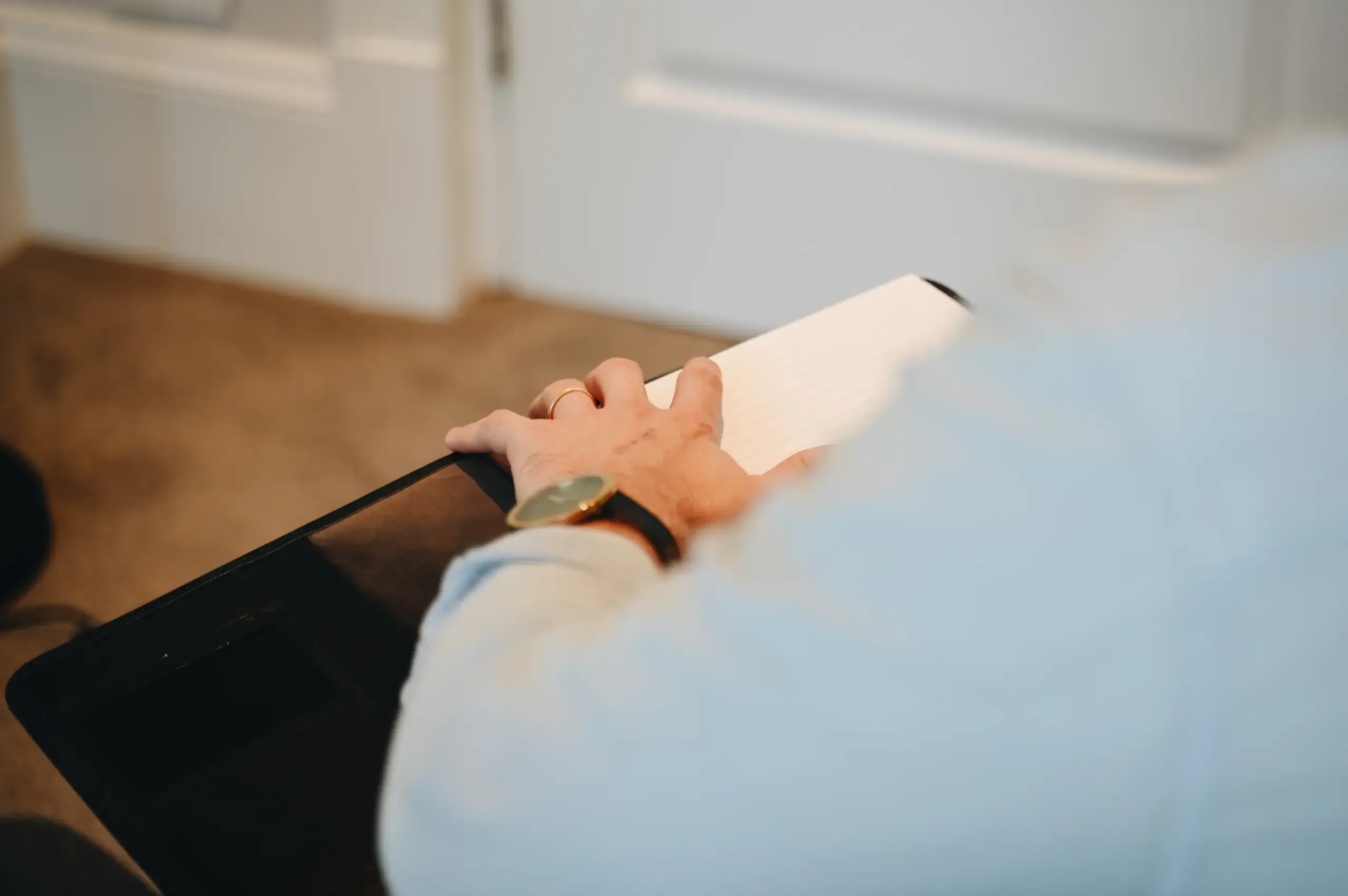 Modern minimalist therapy office with warm wood accents